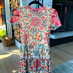 Desigaul.dress with sheer pleated tiers.  Size small.